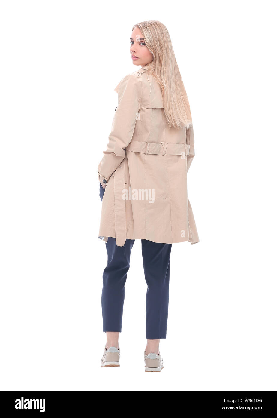 Trendy woman standing rear view Cut Out Stock Images & Pictures - Alamy