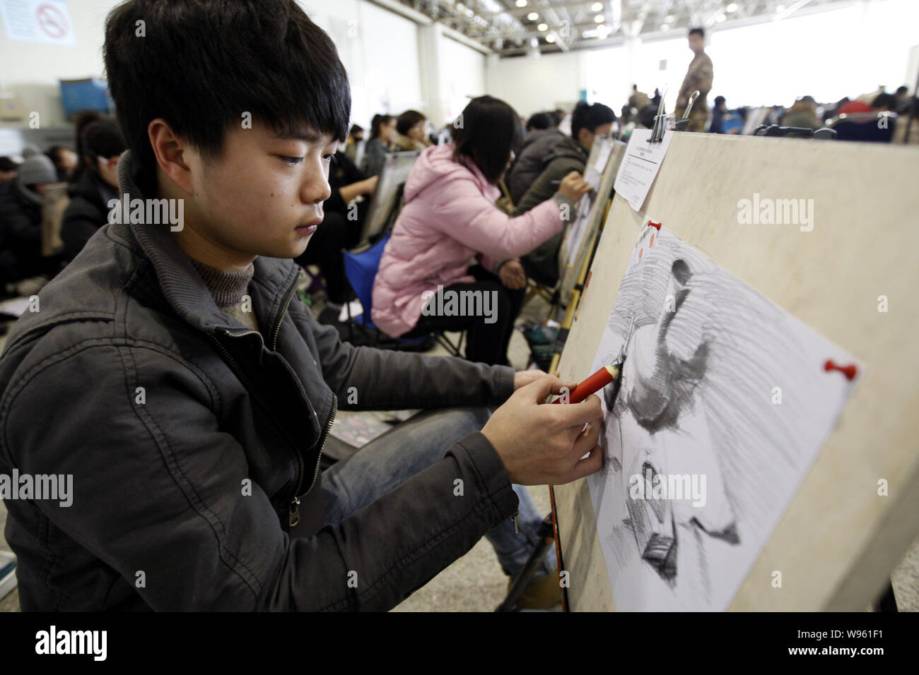 Chinese candidates take part in the entrance examination for art