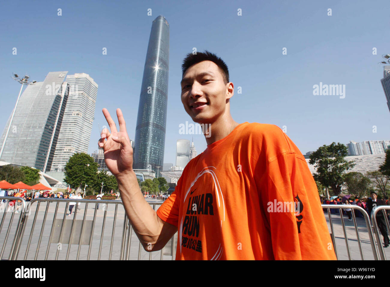 FILEChinese basketball player Yi Jianlian poses during a 10km
