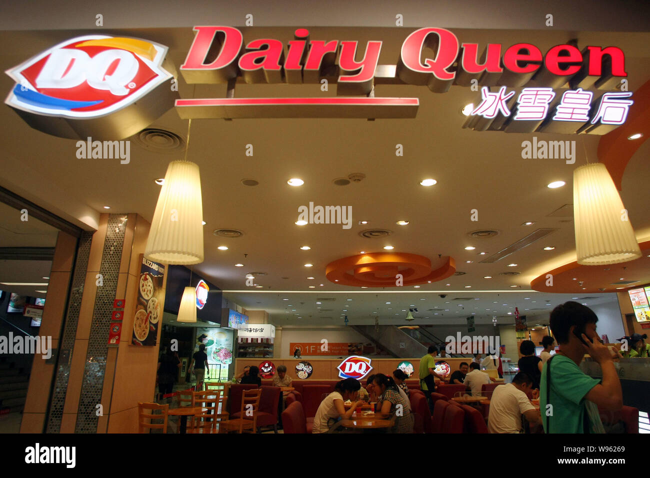 --File--Customers are seen at a Dairy Queen store in Shanghai, China, 3 August 2011.   International Dairy Queen Inc, part of Warren Buffetts Berkshir Stock Photo
