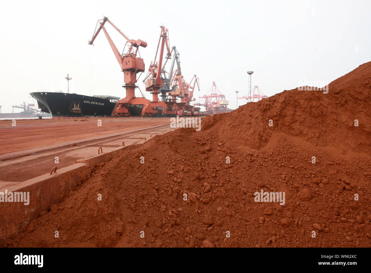 FILE--Piles of rare earth to be exported to Japan are pictured at the Port  of Lianyungang in Lianyungang city, east Chinas Jiangsu province, 5 Septe  Stock Photo - Alamy