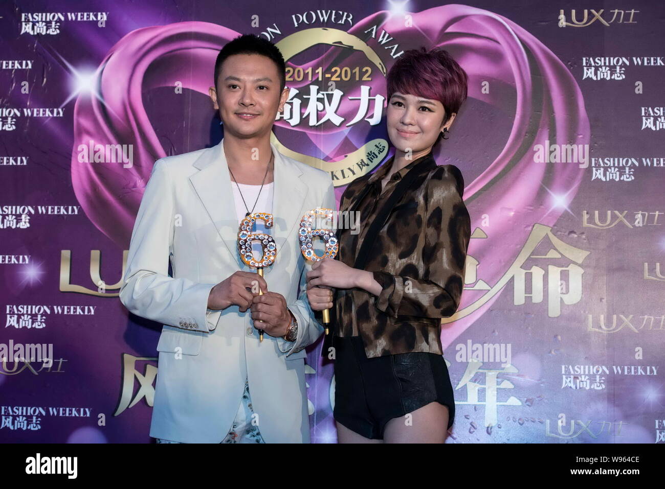 Chinese Actor Ying Xiaotian And Singer Yu Kewei Pose On The Red Carpet During The Fashion Power Awards Ceremony By The Fashion Weekly In Beijing Chin Stock Photo Alamy
