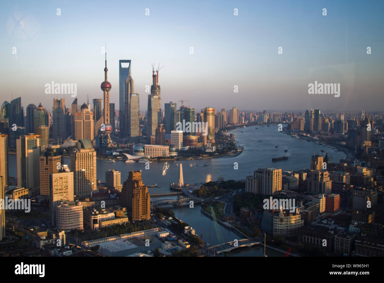 Skyline of Huangpu River, Puxi and Pudong with clusters of skyscrapers ...