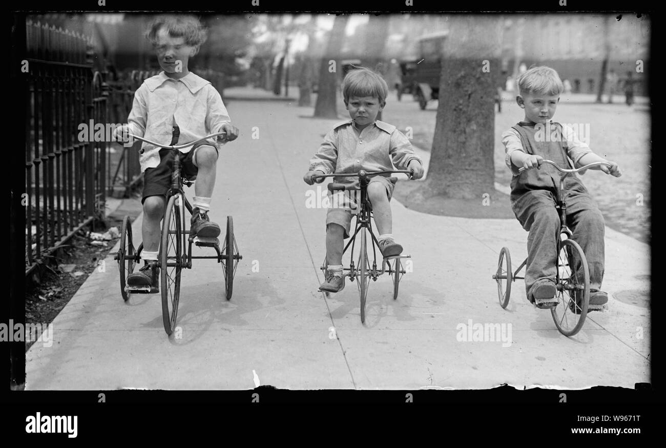 Allen children on tricycles, Wash., D.C Stock Photo Alamy