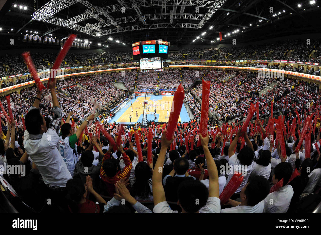 Chinese Basketball Fans Hold Up Inflatable Hammers To Show Support