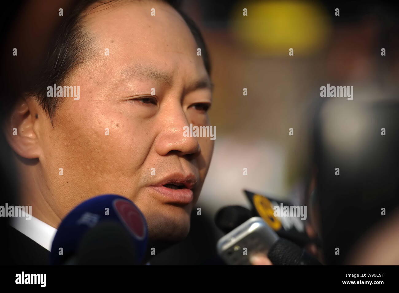 Peng Qinghua, director of the central governments liaison office, is pictured in an interview during the funeral of two volunteers (which had died of Stock Photo