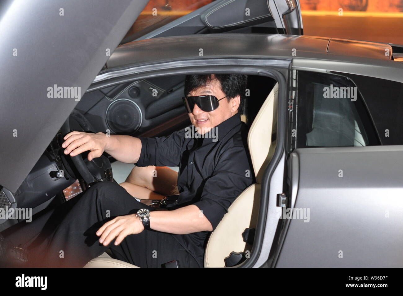 Hong Kong kungfu superstar Jackie Chan steps out of a