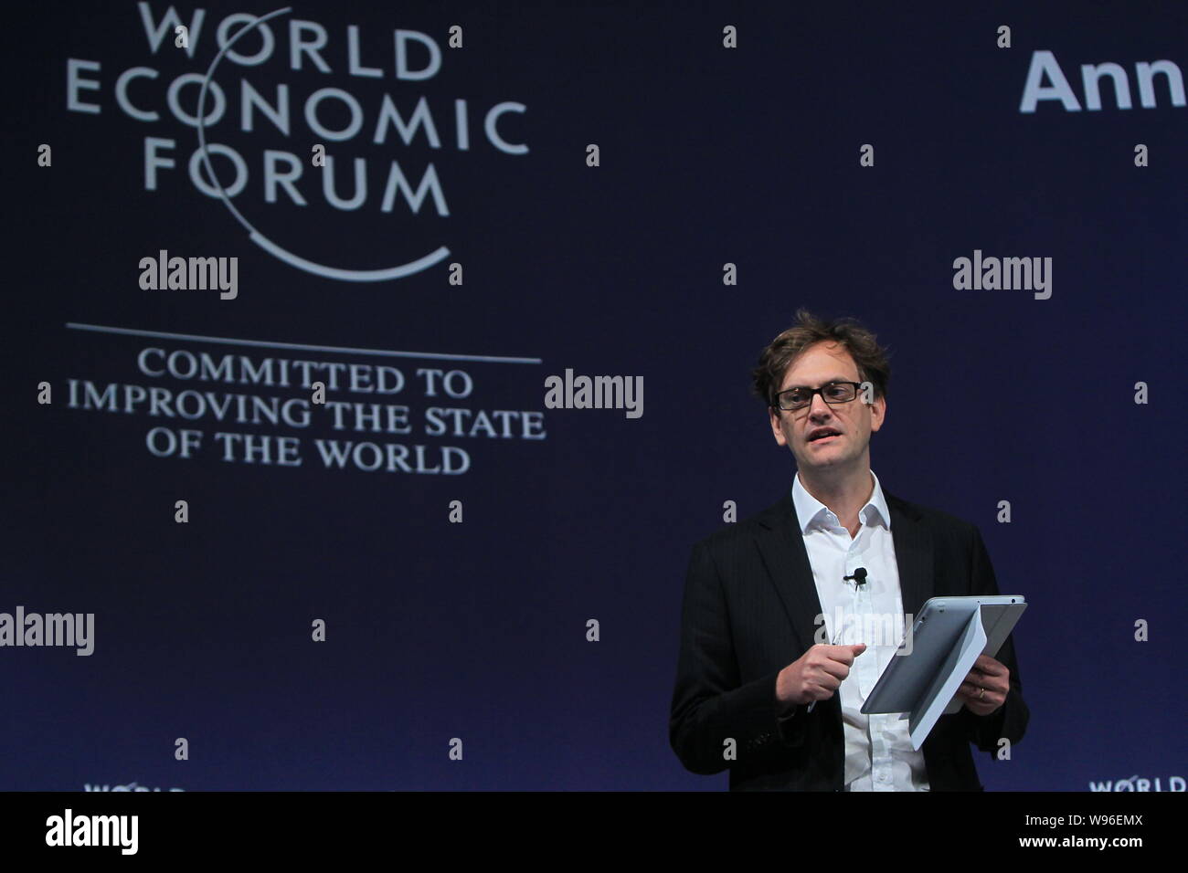 Thomas Crampton, regional director of 360 Digital Influence for Ogilvy in Asia Pacific region, speaks at a meeting during the World Economic Forum 201 Stock Photo