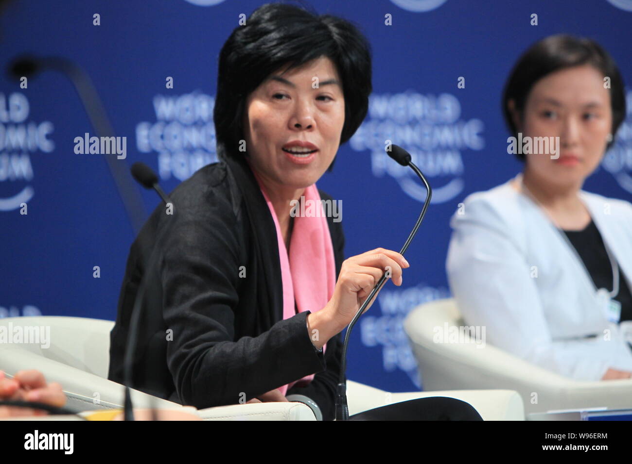 Director of China Enterpreneur magazine He Zhenhong speaks as she ...