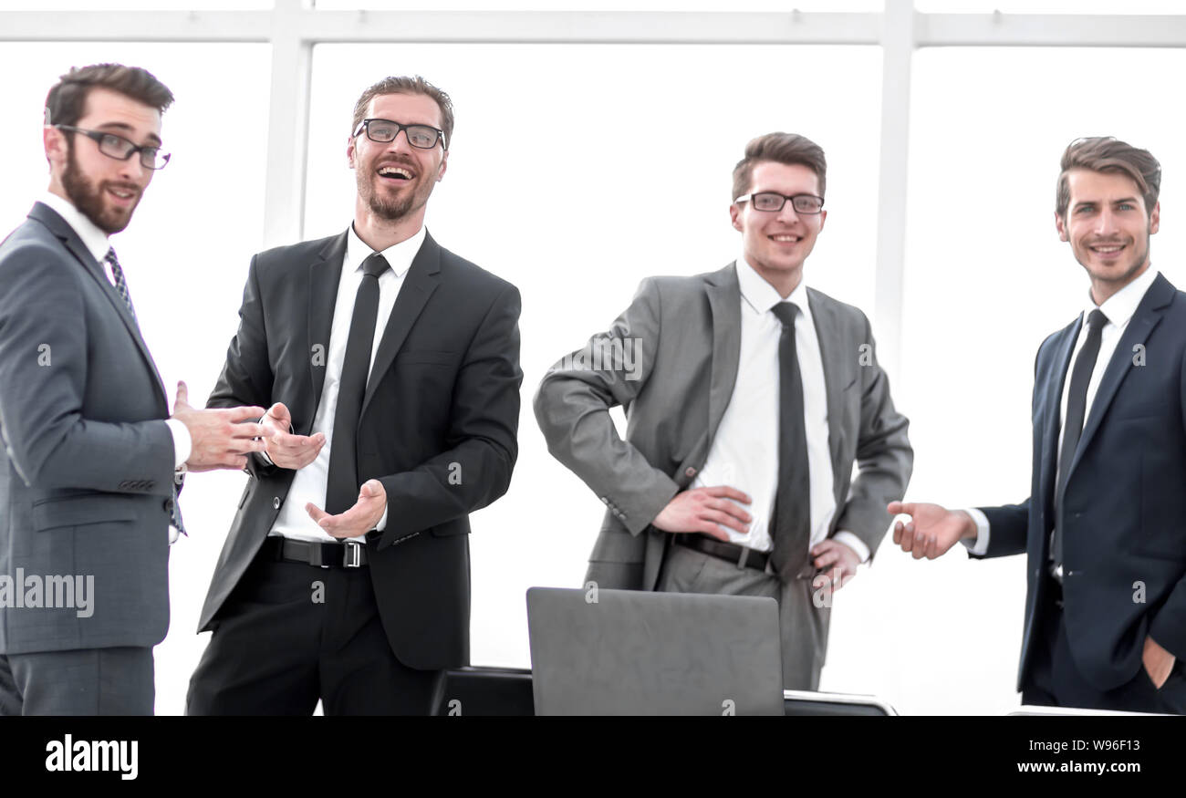 professional business team standing in the office Stock Photo - Alamy