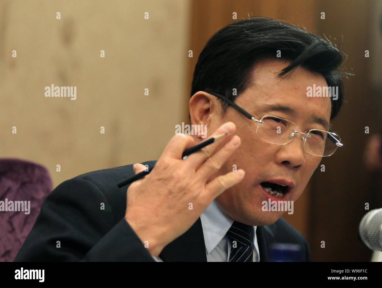 Liang Wengen, Chairman of Sany Group, answers a question at an