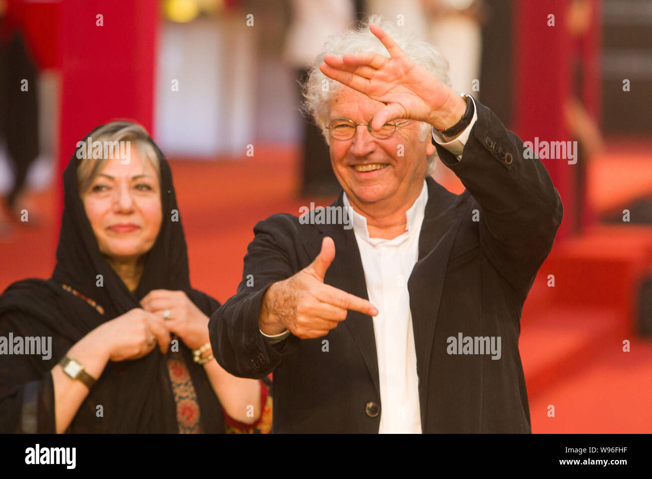 The jury members, Iranian director Rakhshan Banietemad (L) and French film director Jean Jacques Annaud pose on the red carpet prior to the closing ce Stock Photo