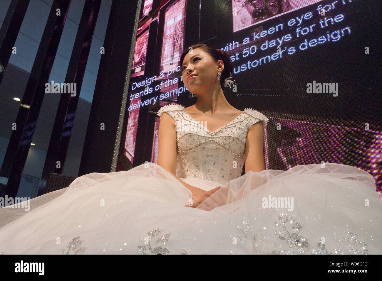 A Chinese Model Displays A Wedding Gown During The 22nd China