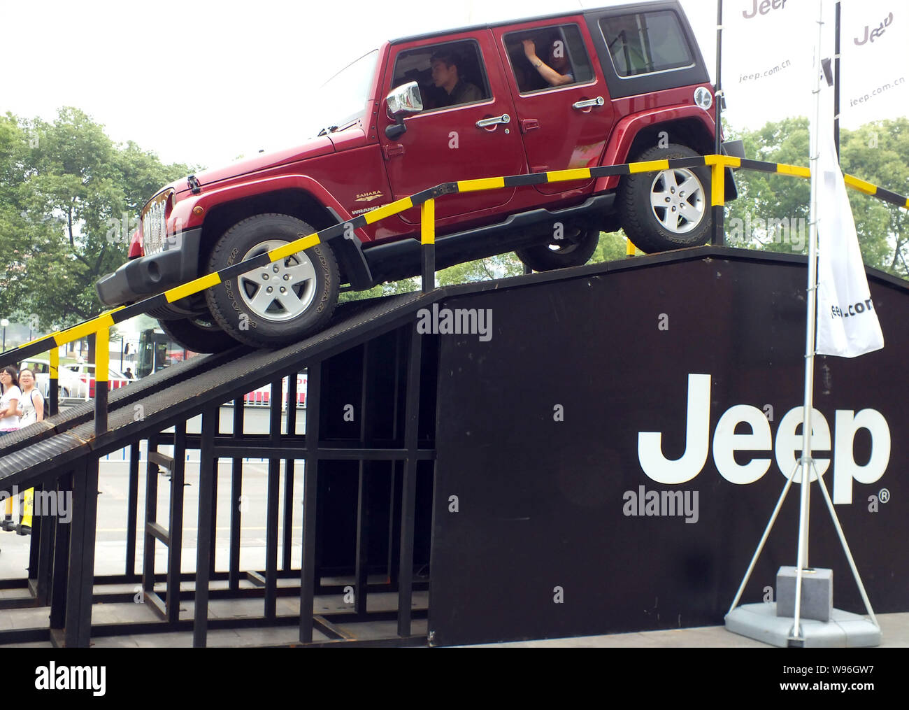 --File--Customers try out a Jeep SUV during an exhibition in Yichang, central Chinas Hubei province, 6 May 2012.   Jeep sales rose 63 percent last yea Stock Photo