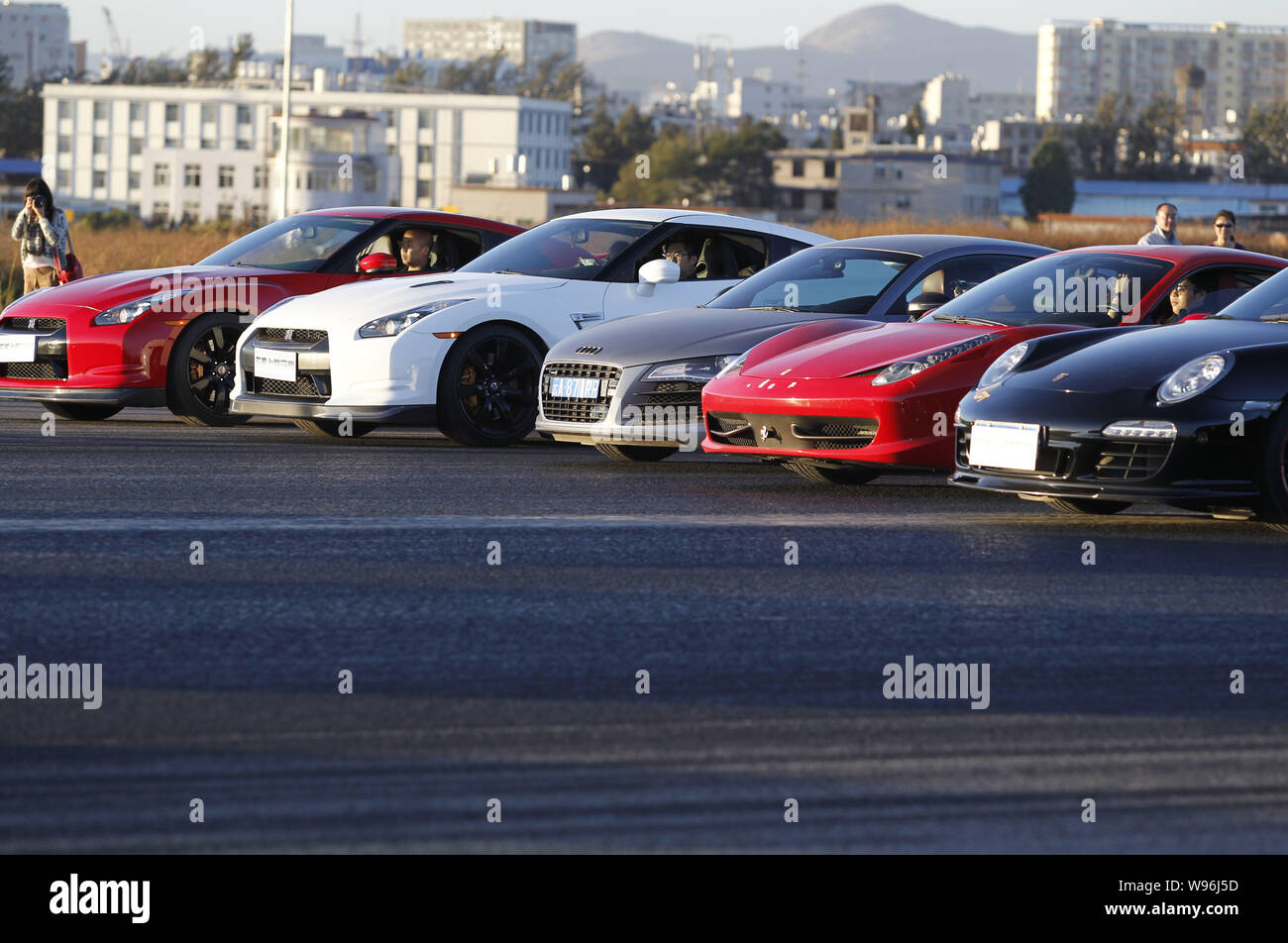 Supercars Are Lined Up On The Runway During A Test Drive At The Kunming Wujiaba International Airport In Kunming City Southwest Chinas Yunnan Provinc Stock Photo Alamy Supercars Are Lined Up On The Runway During A Test Drive At The Kunming Wujiaba International Airport In Kunming City Southwest Chinas Yunnan Provinc Stock Photo Alamy