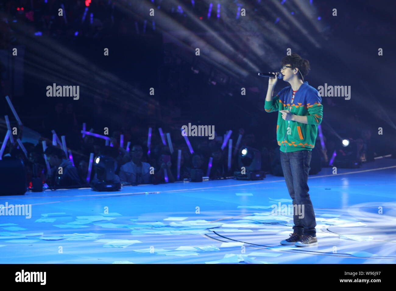 Chinese singer and actor Hu Xia sings on the stage of New Year Celebration rehearsal in Shenzhen, Guangzhou,18 December 2012. Stock Photo