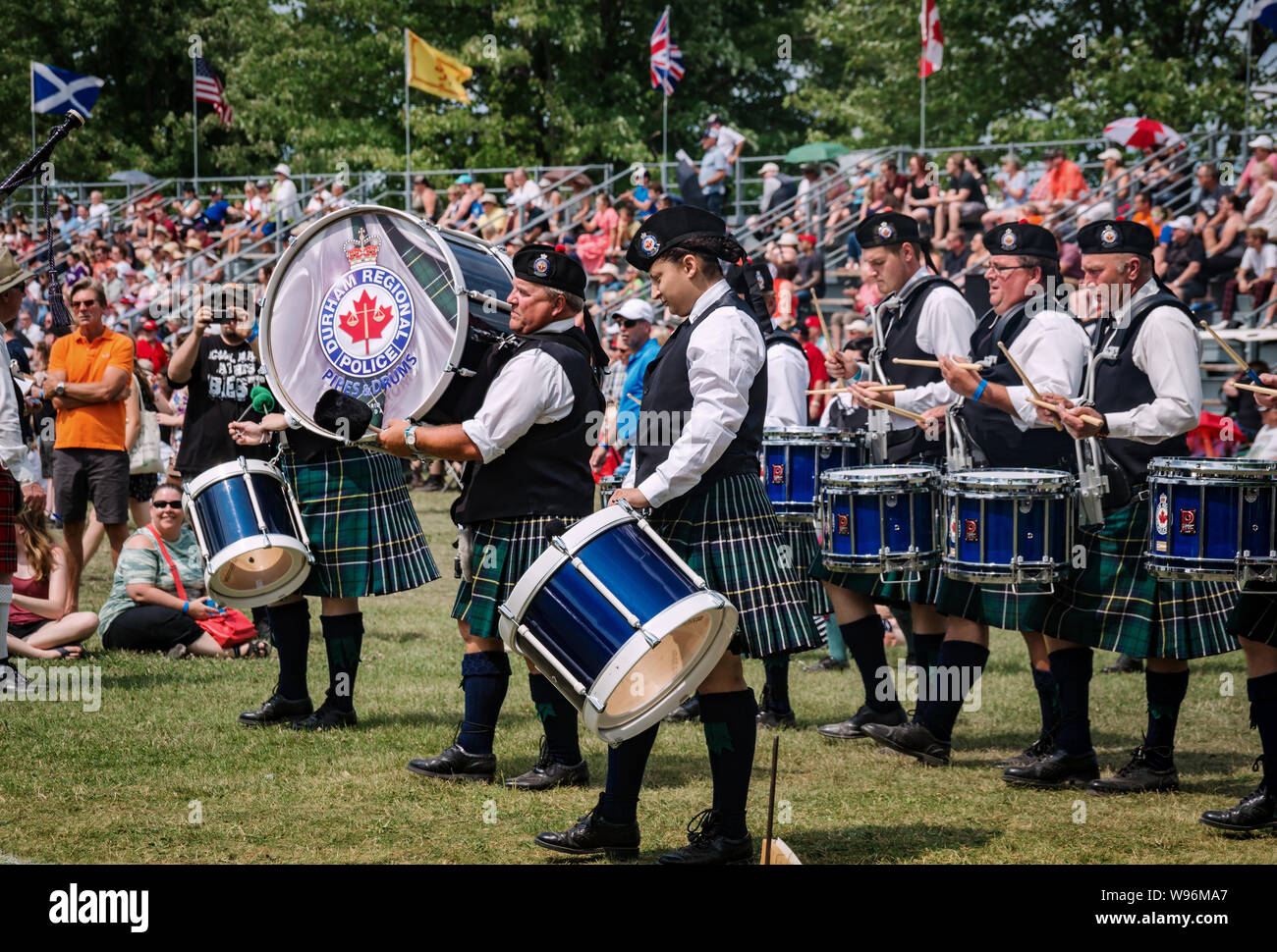 Fergus, Ontario, Canada - 08 11 2018: Drummers of the Durham Regional Police Pipes and Drums band participating in the Pipe Band contest held by Piper Stock Photo