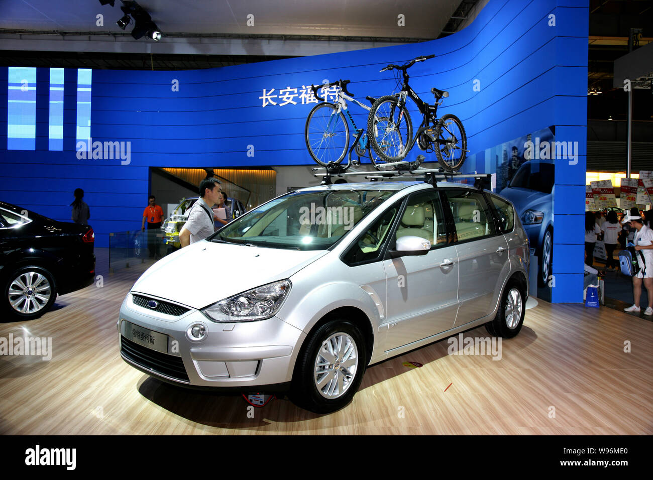 File A Visitor Looks At A Ford S Max During An Auto Show In Chongqing China 12 June 2010 Changan Ford Mazda Has Begun A Recall Of Its Ford Mo Stock Photo Alamy
