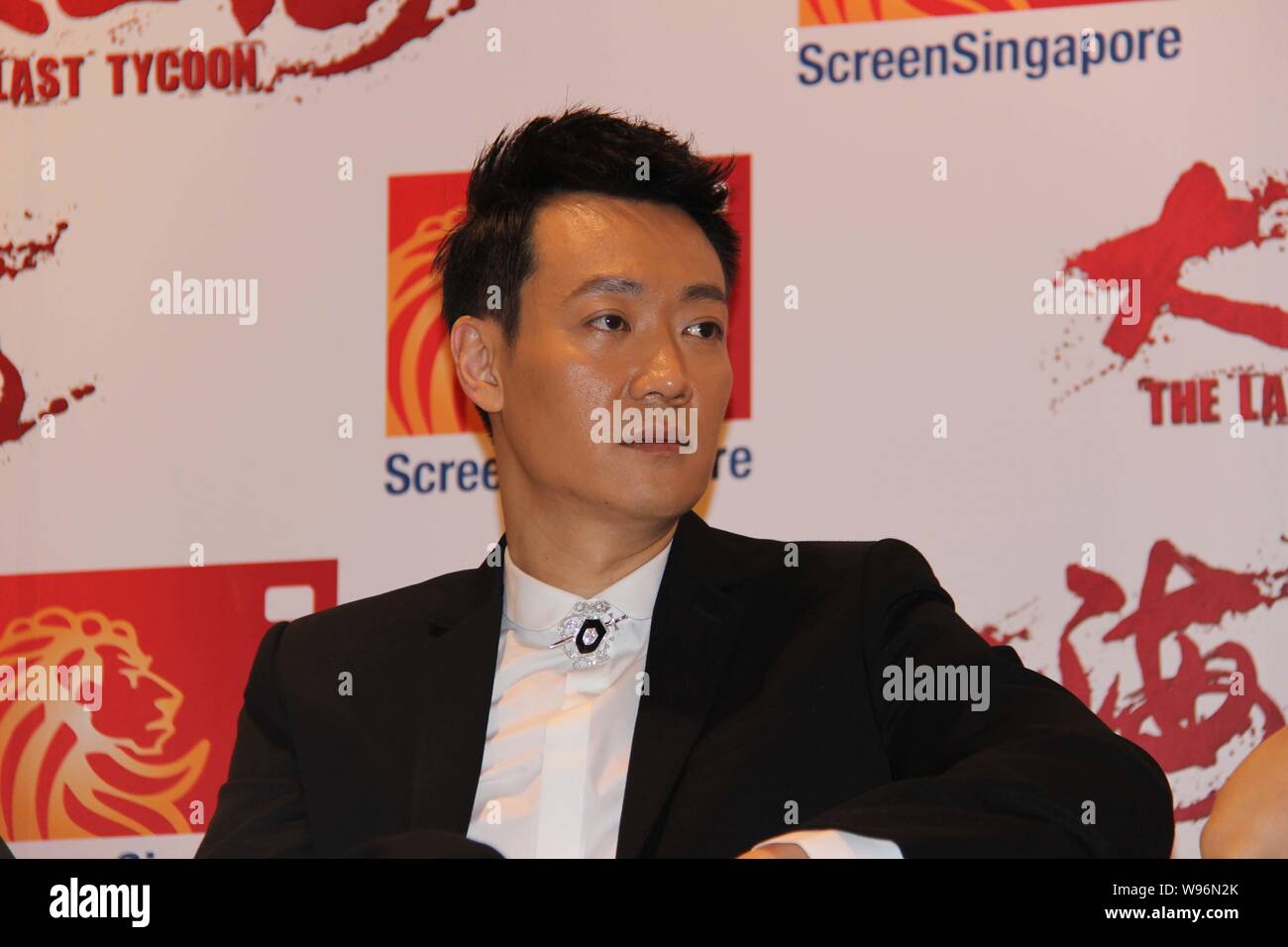 Actor Xin Bai Qing attends a press conference for his latest movie,The Last Tycoon, in Singapore, 4 December 2012. Stock Photo