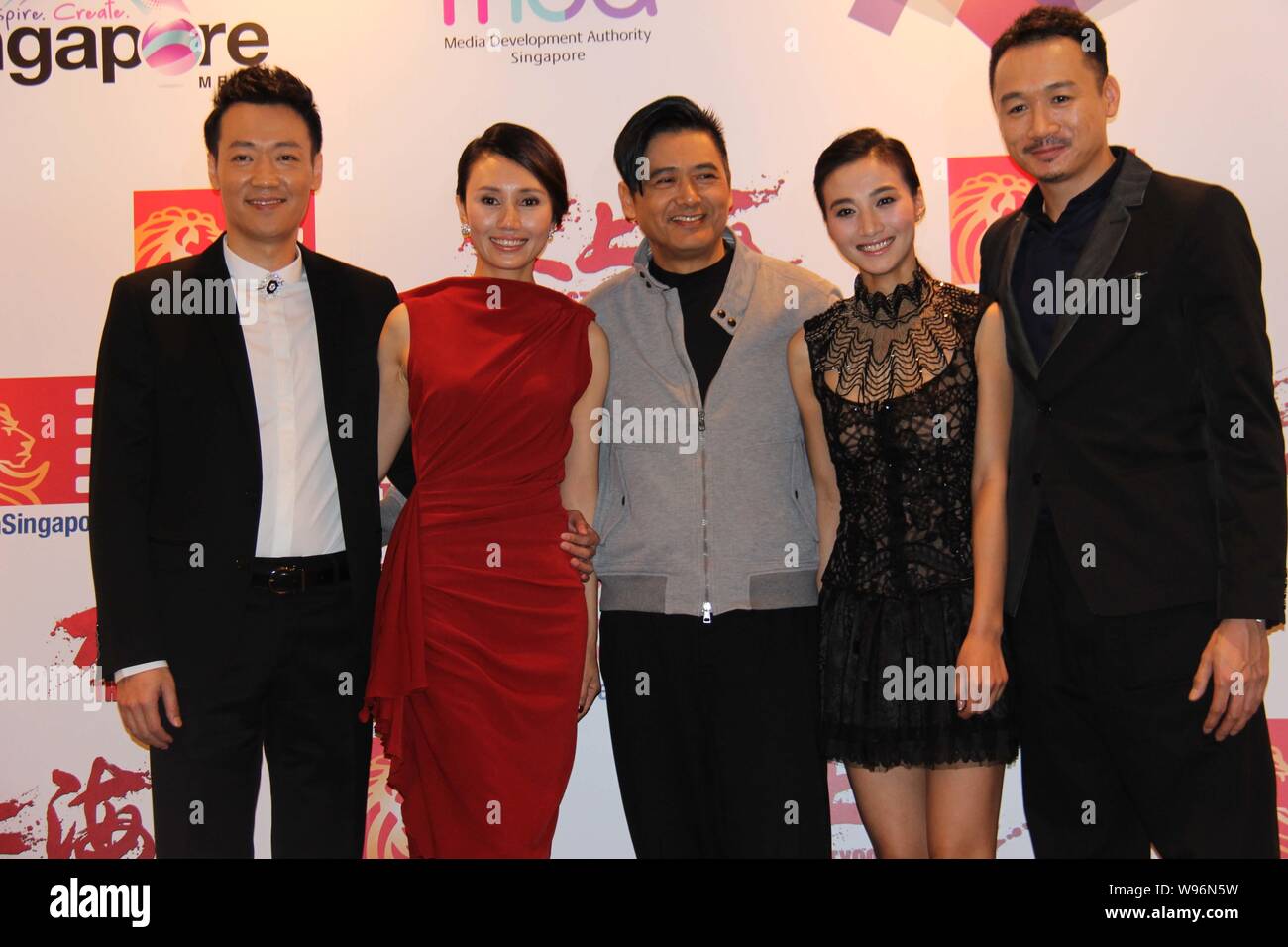 (From left) Chinese actor Xin Baiqing, actress Yuan Quan, Hong Kong actor Chow Yun-fat, Chinese actress Feng Wenjuan and actor Gao Hu pose at a press Stock Photo