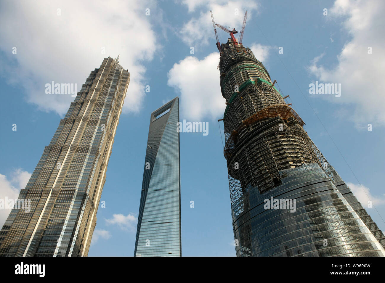 The Shanghai Tower, right, is under construction next to Jinmao Tower ...