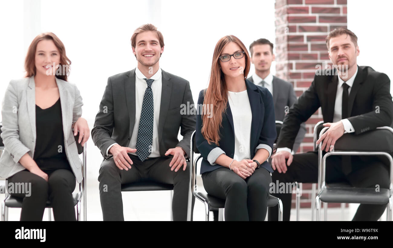 Business people sitting in the waiting room Stock Photo - Alamy