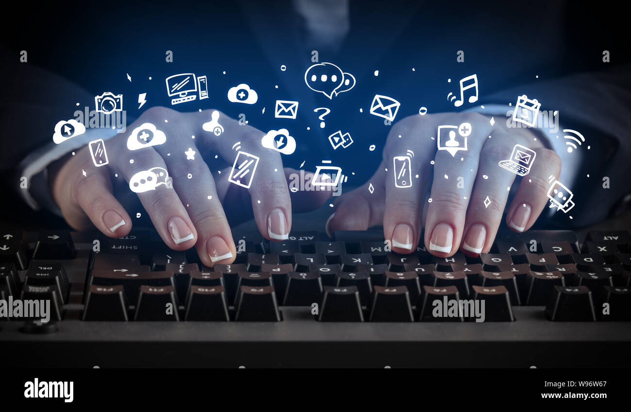 Blogger woman typing on keyboard with drawn application icons around ...