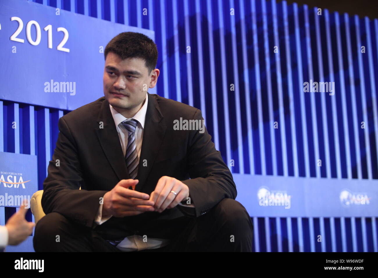 Retired Chinese basketball player Yao Ming is pictured during the BFA Annual Conference 2012 in Boao, south Chinas Hainan Province, 1 April 2012.   Fo Stock Photo