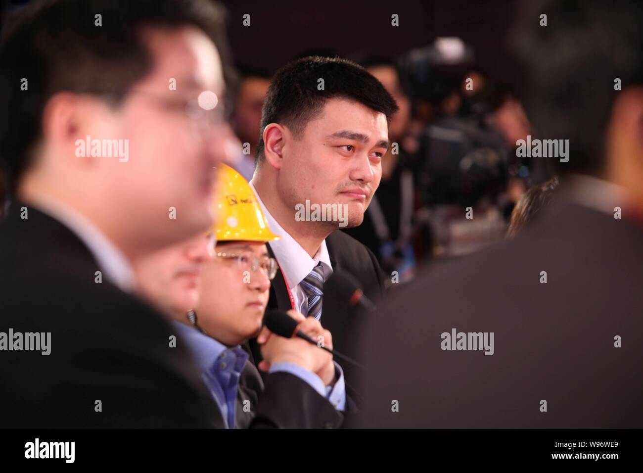 Retired Chinese basketball player Yao Ming (C) is pictured during the BFA Young Leaders Roundtable 2012 in Qionghai, south Chinas Hainan province, 1 A Stock Photo