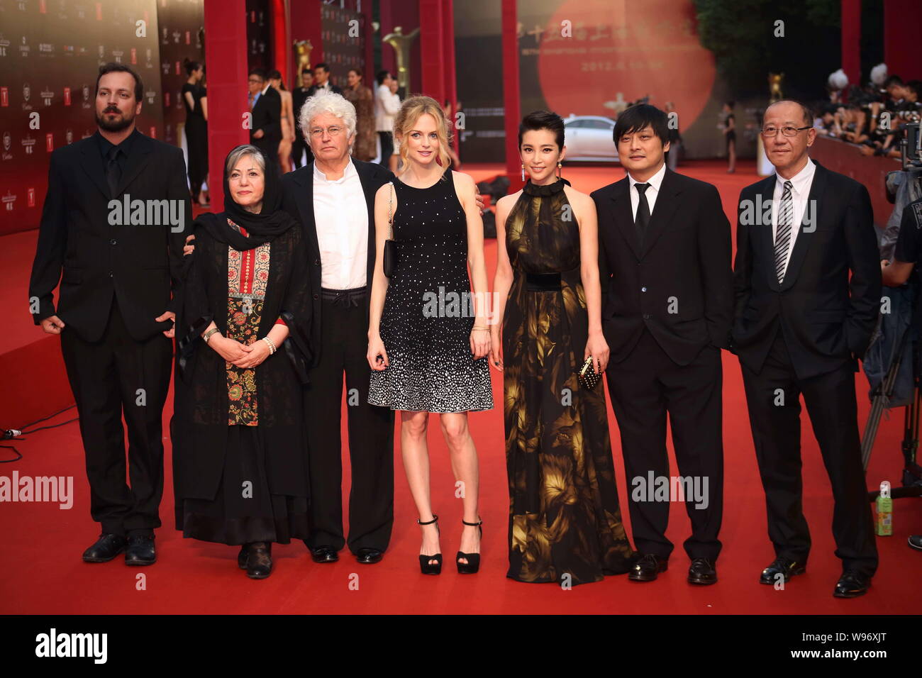 The jury members, from left, Hungarian filmmaker Gyorgy Palfi, American actress Heather Graham, French film director Jean Jacques Annaud, Chinese actr Stock Photo