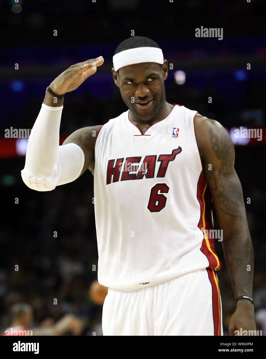 LeBron James of the Miami Heat gestures as he and his teammate compete against the Los Angeles Clippers during their second match of their NBA China G Stock Photo