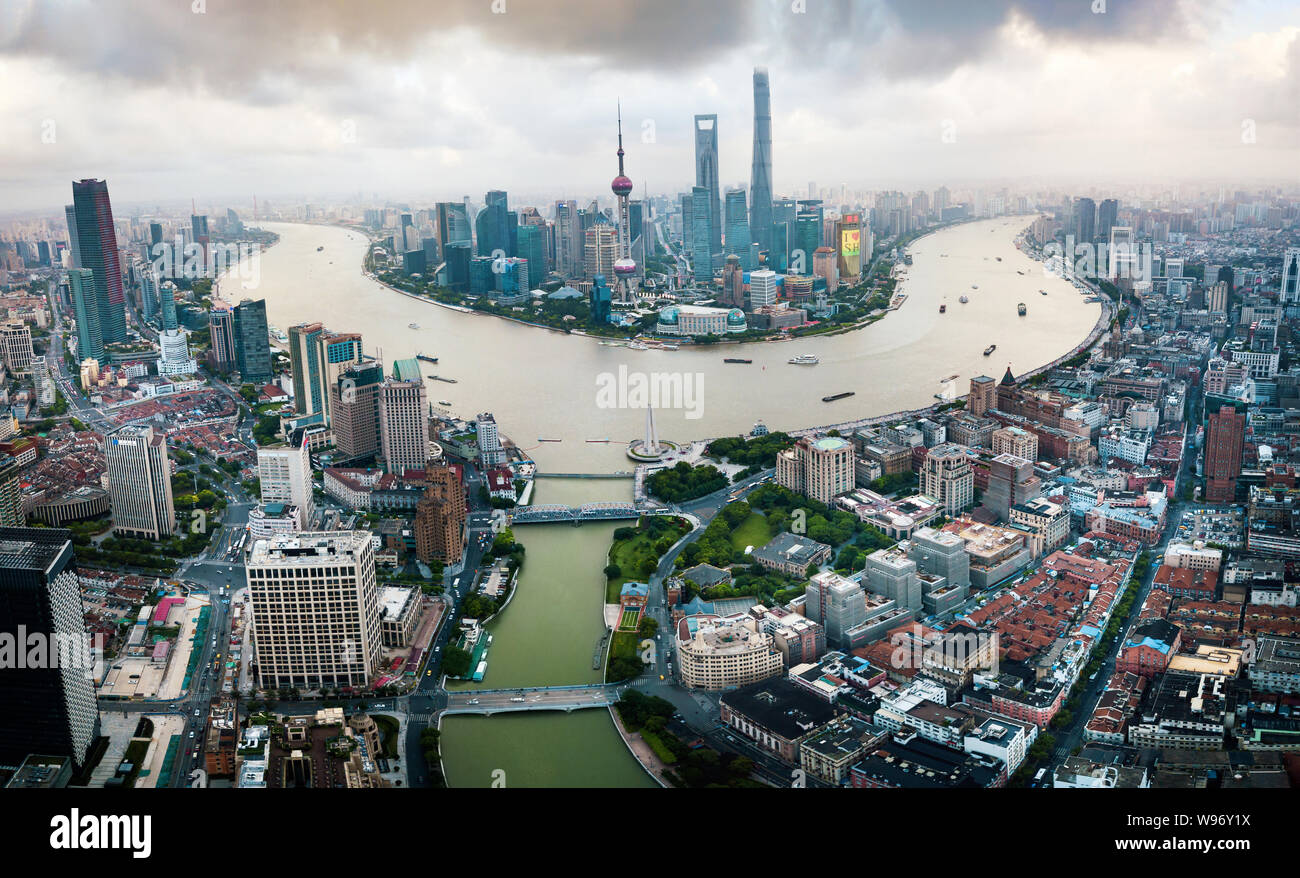 Shanghai skyline aerial view with amazing skyscrapers rising above Haungpu river in China Stock Photo