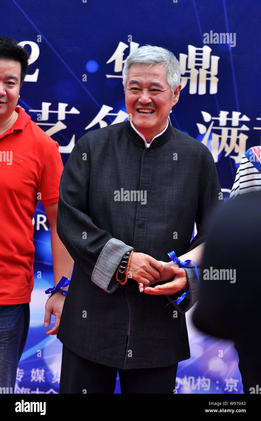 Chinese famous comedian Zhao Benshan poses on the red carpet during the