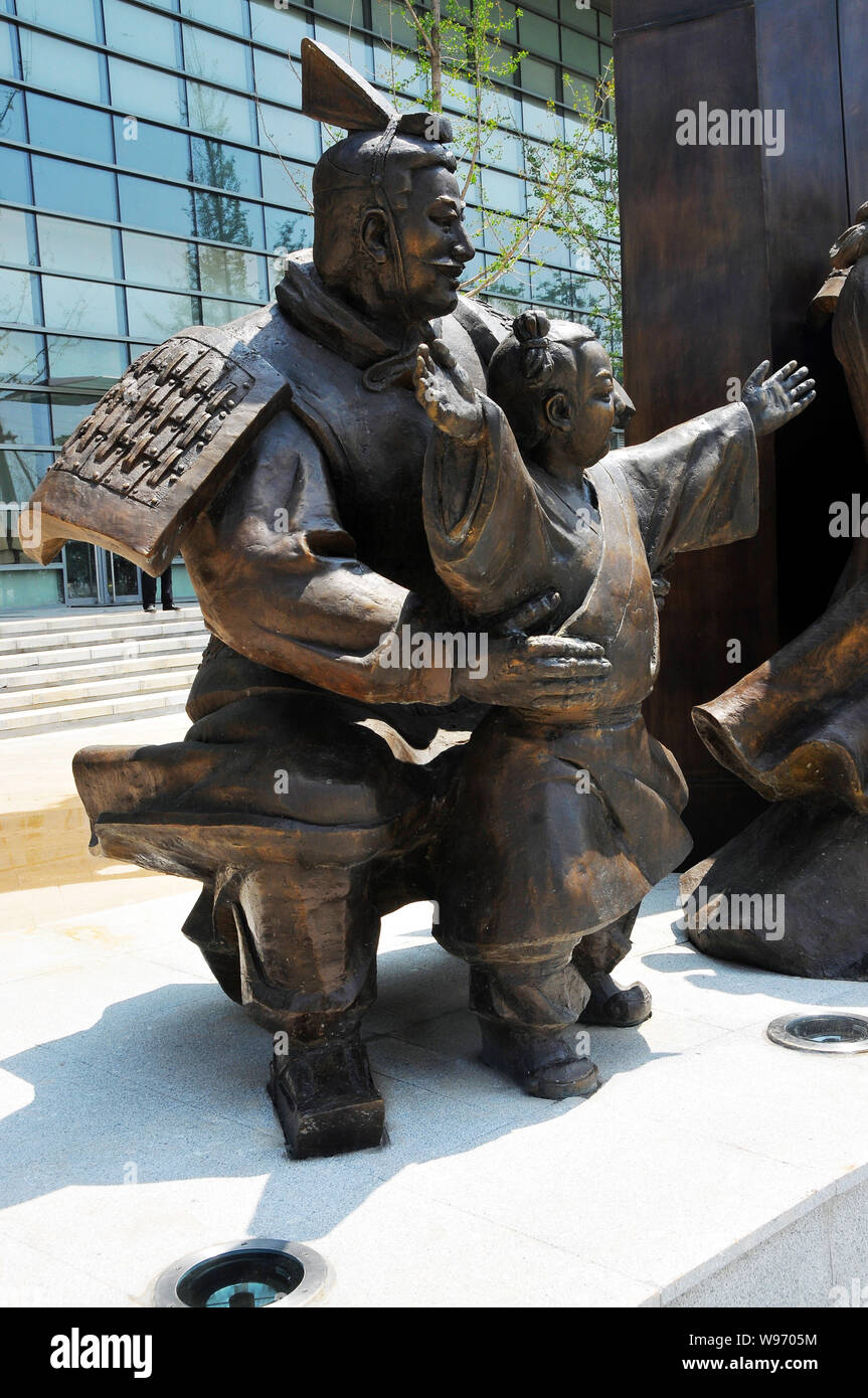 A set of bronze statues on the theme of Qin Dynasty are pictured at the