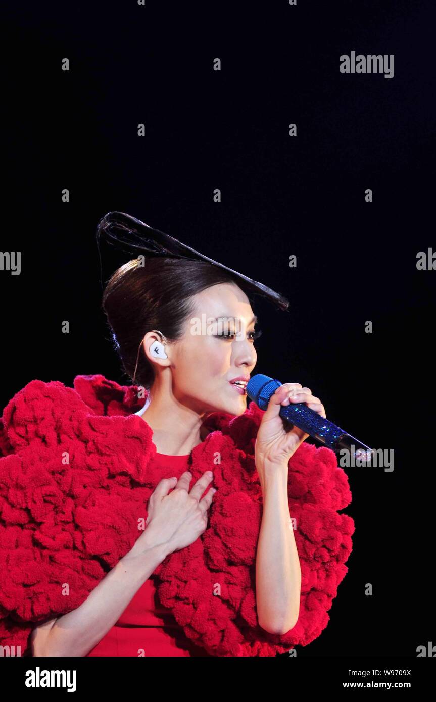 Taiwanese singer Fan Fan performs during her concert in Guangzhou ...