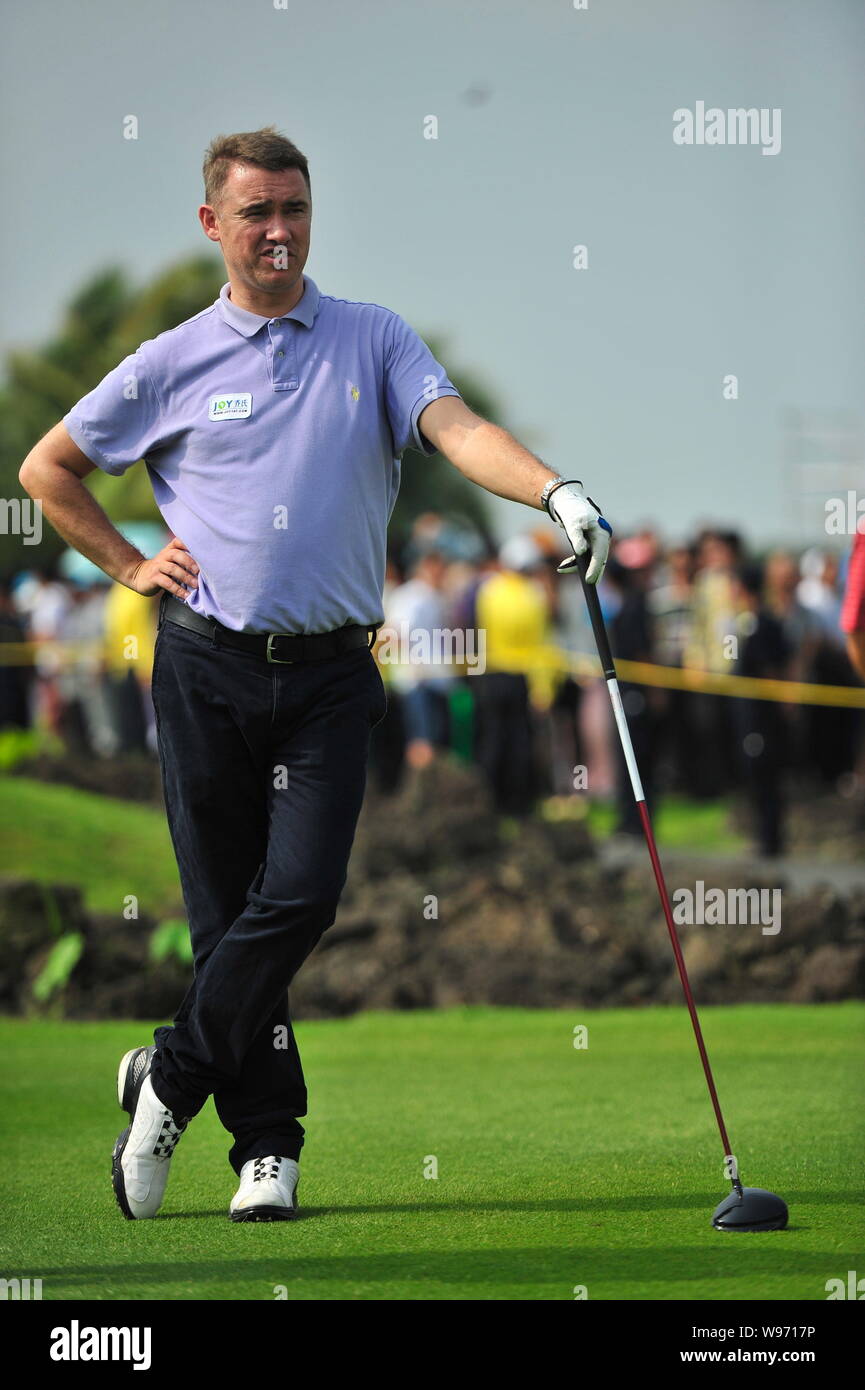 Scottish snooker player Stephen Hendry looks on during the 2012 Mission Hills World Celebrity Pro-Am golf tournament in Haikou city, south Chinas Hain Stock Photo