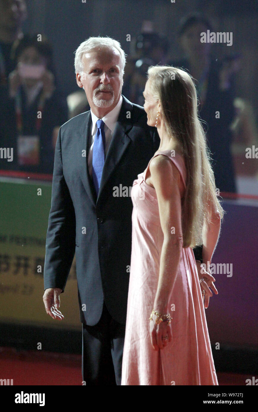 Canadian film director and producer James Cameron and his wife Suzy Amis are pictured on the red carpet ahead of the opening ceremony for the 2nd Beij Stock Photo