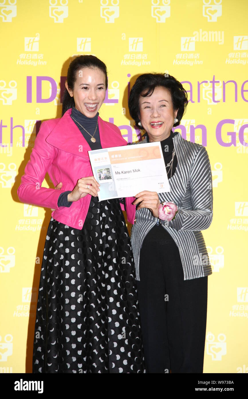 Hong Kong actress Karen Mok, left, poses during a press conference of IDEAL( The Intellectually Disabled Education and Advocacy League ) in Hong Kong, Stock Photo