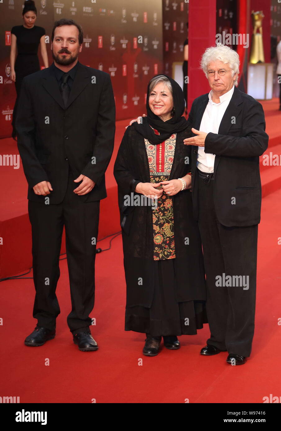 The jury members, from left, Hungarian filmmaker Gyorgy Palfi, Iranian director Rakhshan Banietemad and French film director Jean Jacques Annaud pose Stock Photo