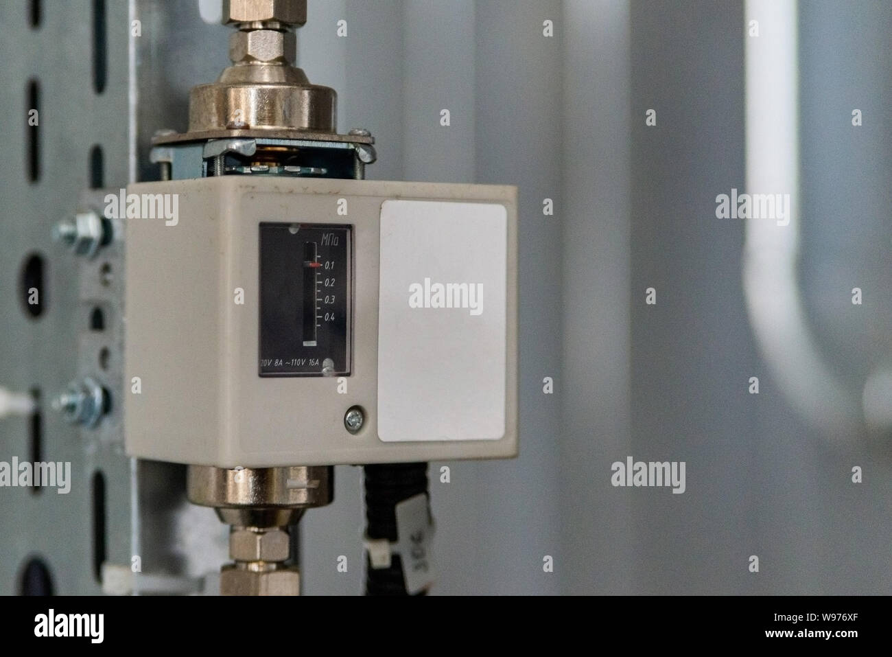 Analog device regulator for efficient automated heating system. Stock Photo