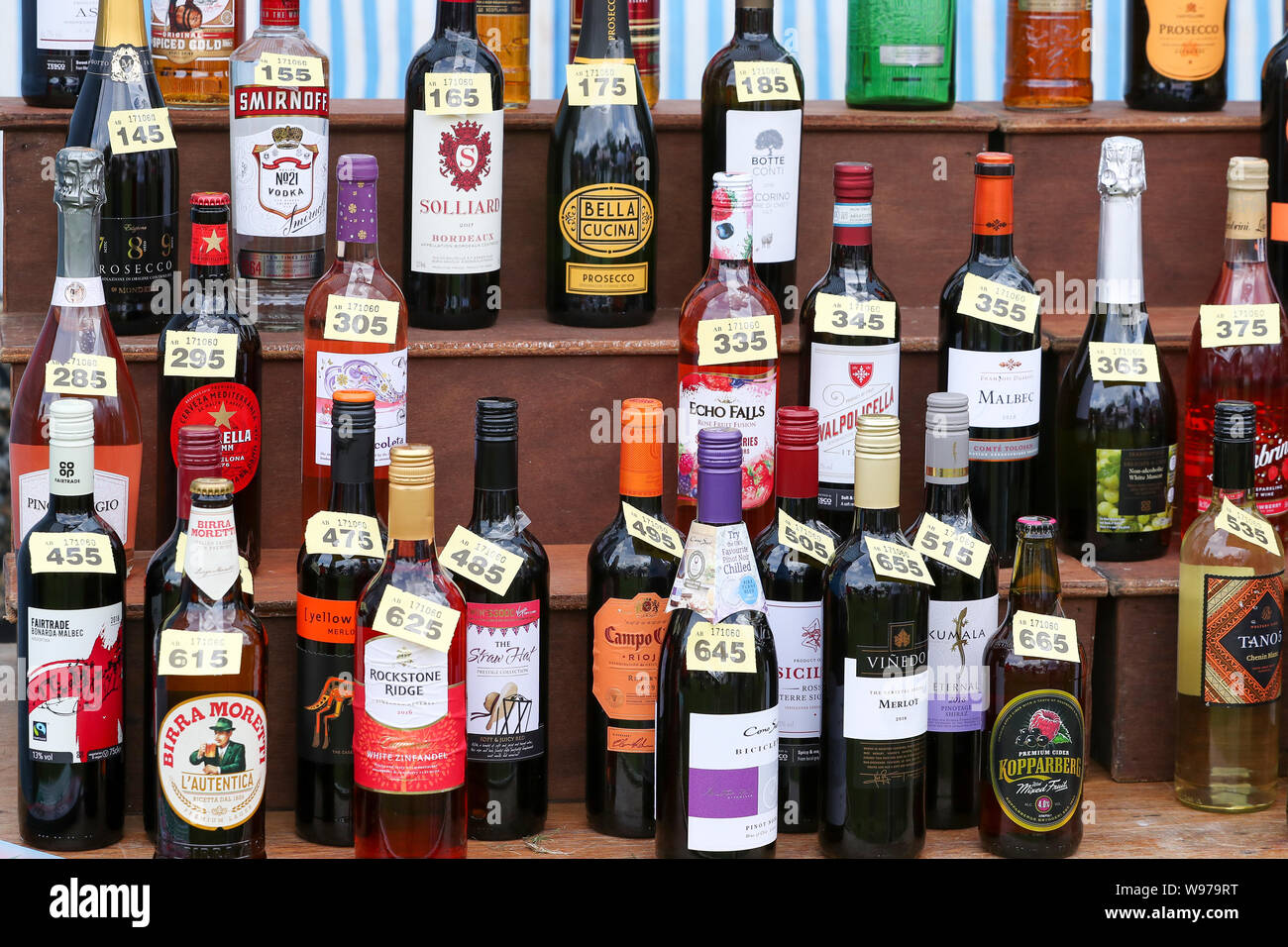 selection of wine bottles and spirits used as raffle prizes Stock Photo