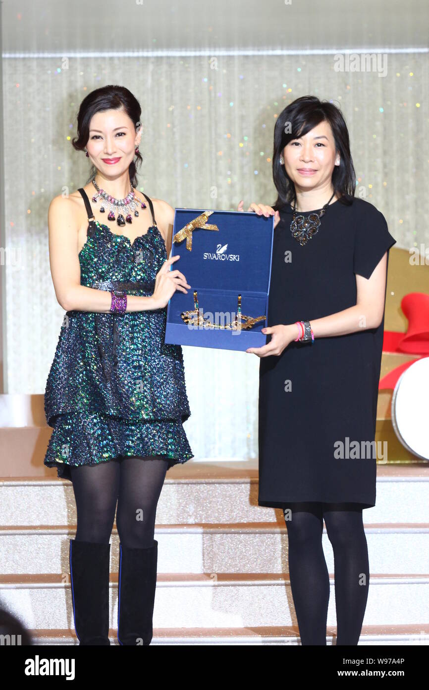 Hong Kong actress Michelle Lee (Michelle Monique Reis) (left) poses at a  Christmas light-up ceremony of Swarovski in Hong Kong, China, 28 November  201 Stock Photo - Alamy
