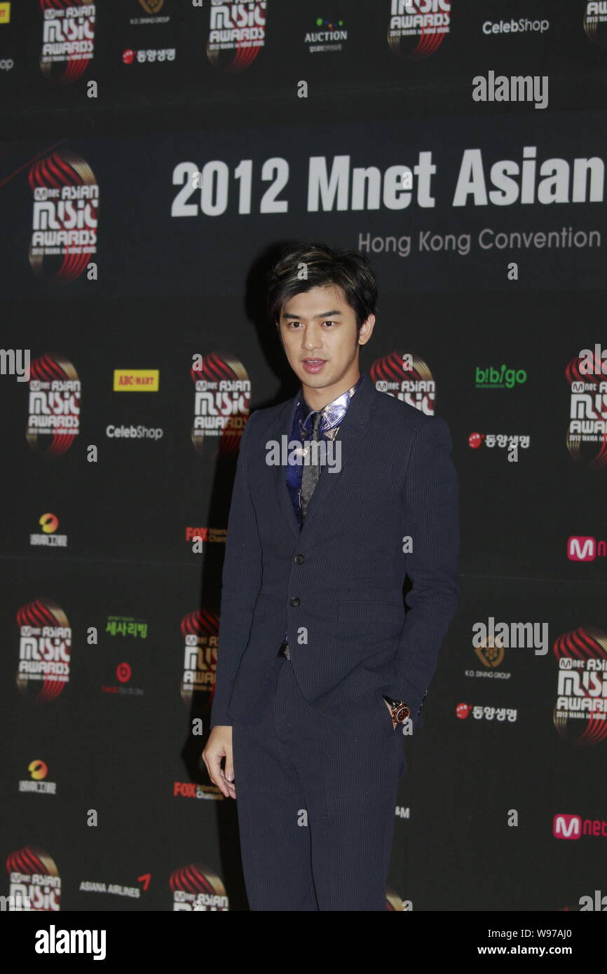 Taiwanese actor Berlin Chen poses on the red carpet as he arrives for ...