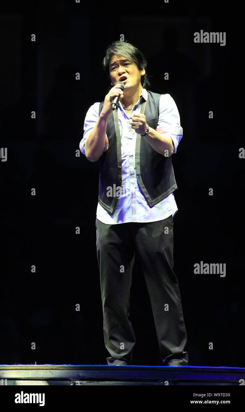 Taiwanese singer Emil Wakin Chau performs during a Rock Records 30th anniversary concert in Hangzhou, east Chinas Zhejiang province, 21 July 2012. Stock Photo