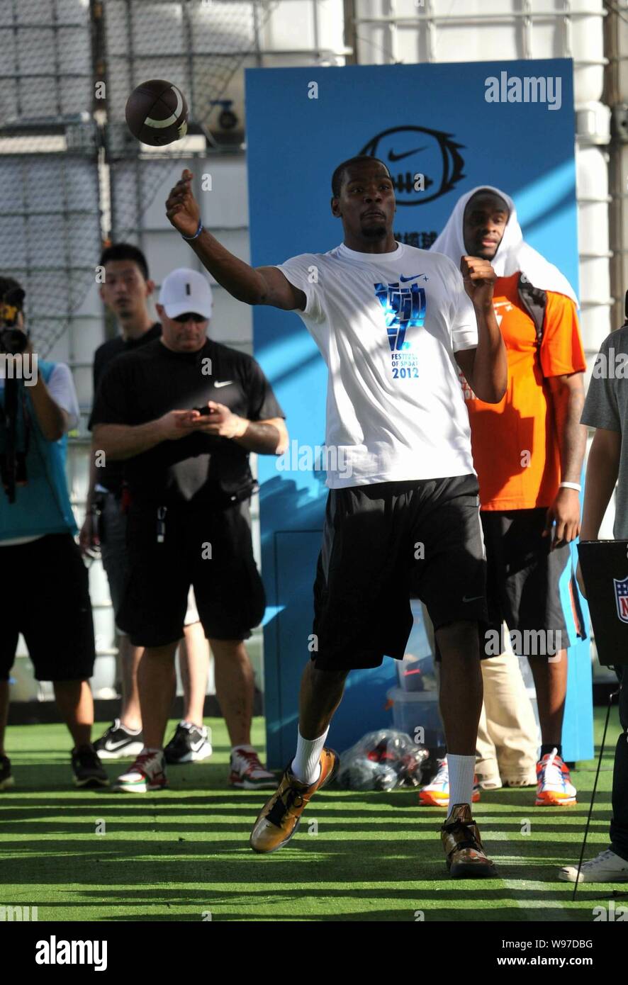 NBA star Kevin Durant of Oklahoma City Thunder plays football at the