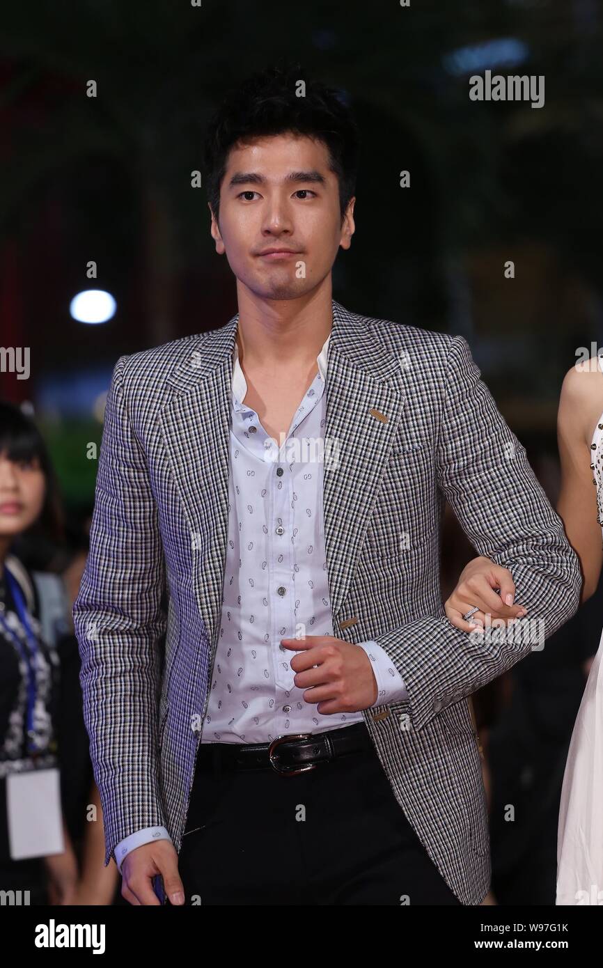 Taiwanese actor Mark Chao walks the red carpet before the premiere of ...