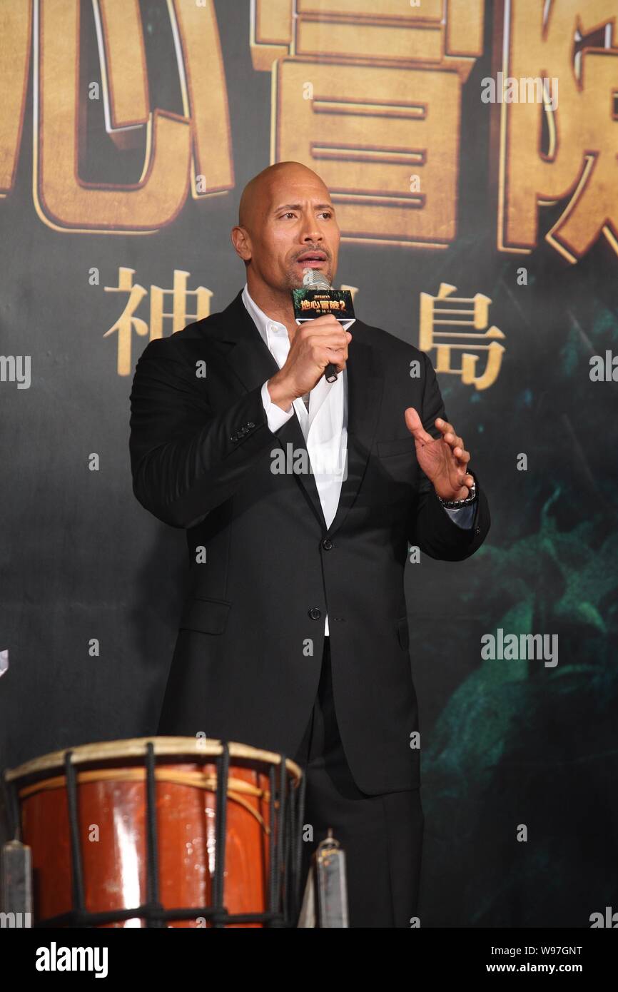 American actor and professional wrestler Dwayne Johnson speaks during a