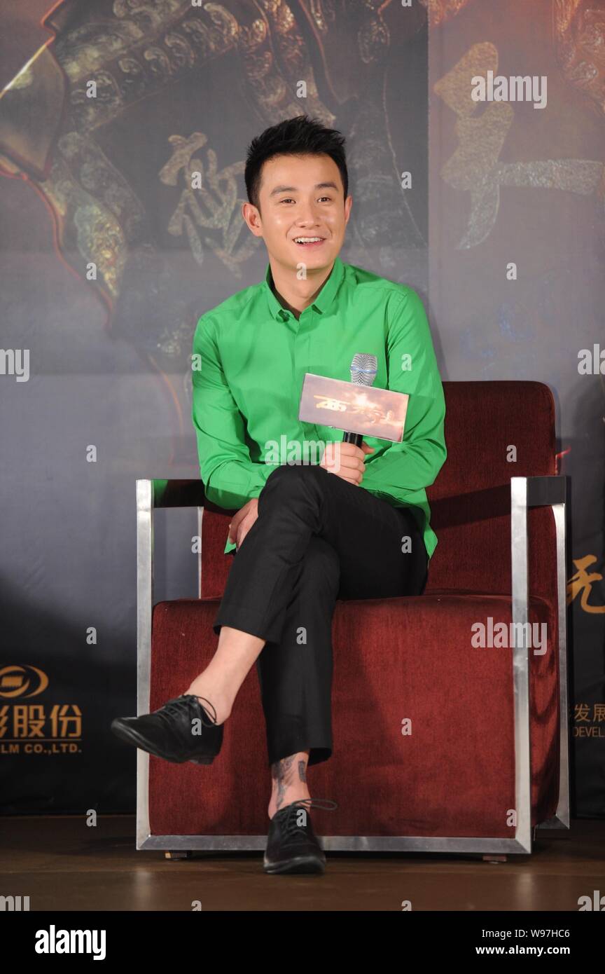 Chinese actor Wen Zhang smiles during a press conference for his latest movie, Odyssey, in Beijing, 27 December 2012. Stock Photo