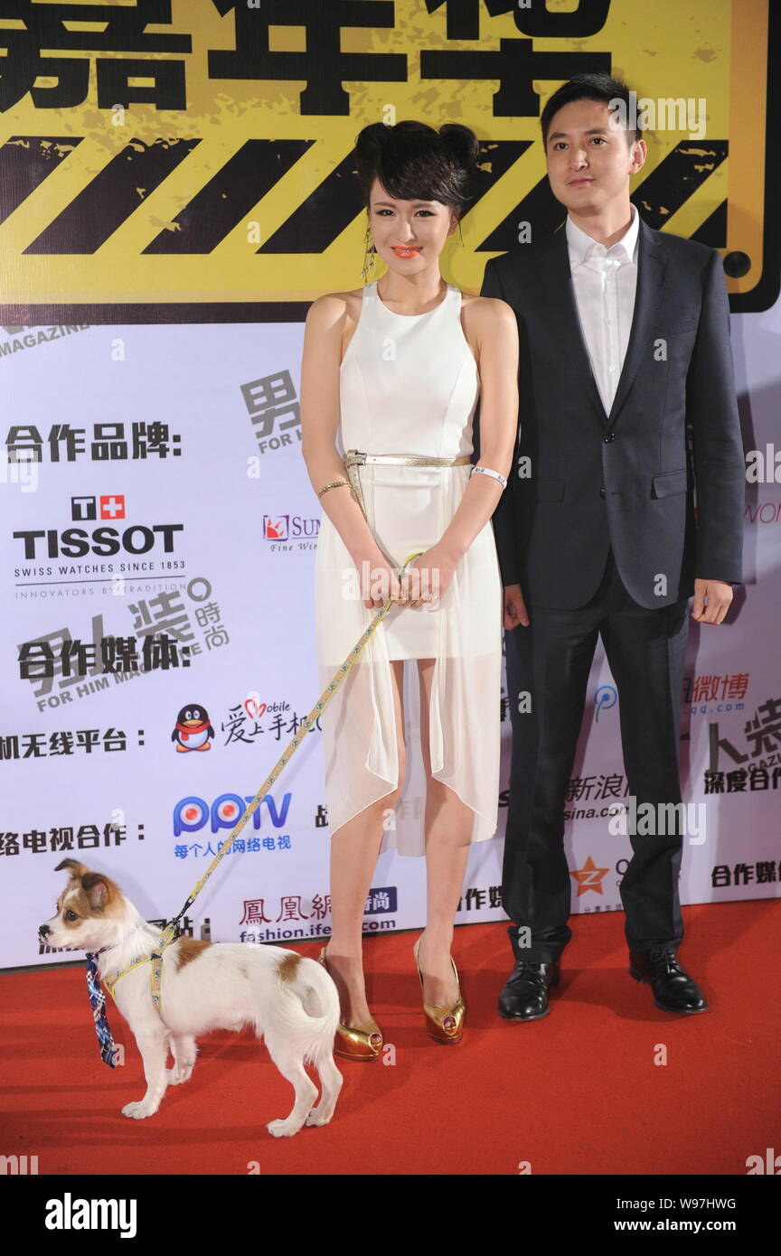 Chinese actress Zheng Yitong and actor Fan Lixin pose as they arrive on ...