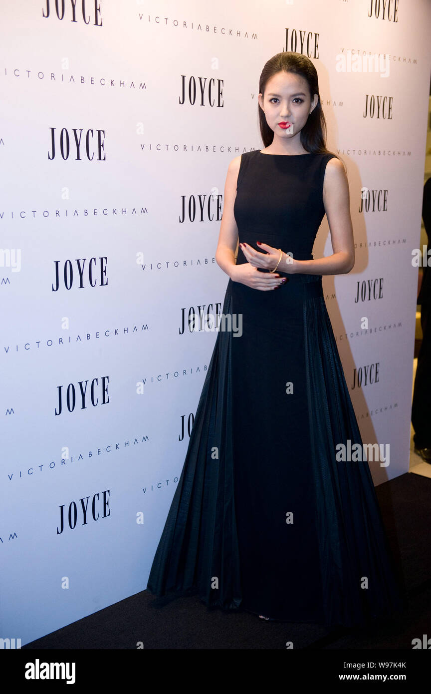 Chinese model Zhang Zilin, winner of the 57th Miss World 2007, poses at a promotional event for fashion brand Victoria Beckham entering Joyce boutique Stock Photo